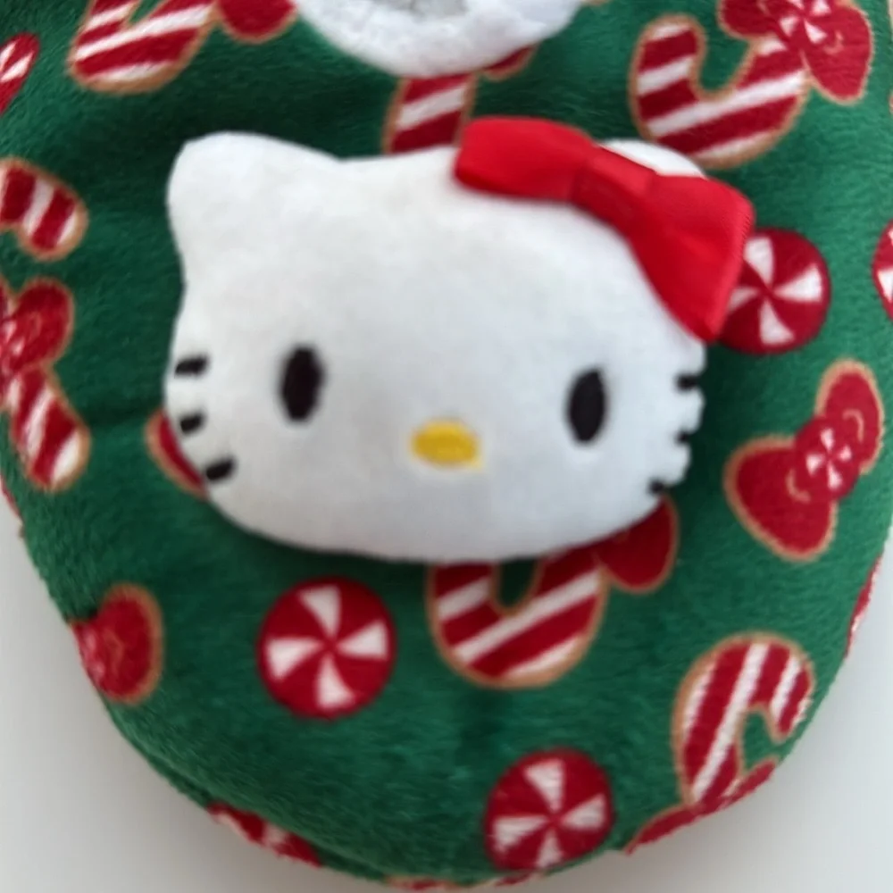 Christmas Hello Kitty size 7 2024 Sanrio slippers in green with red candy canes.